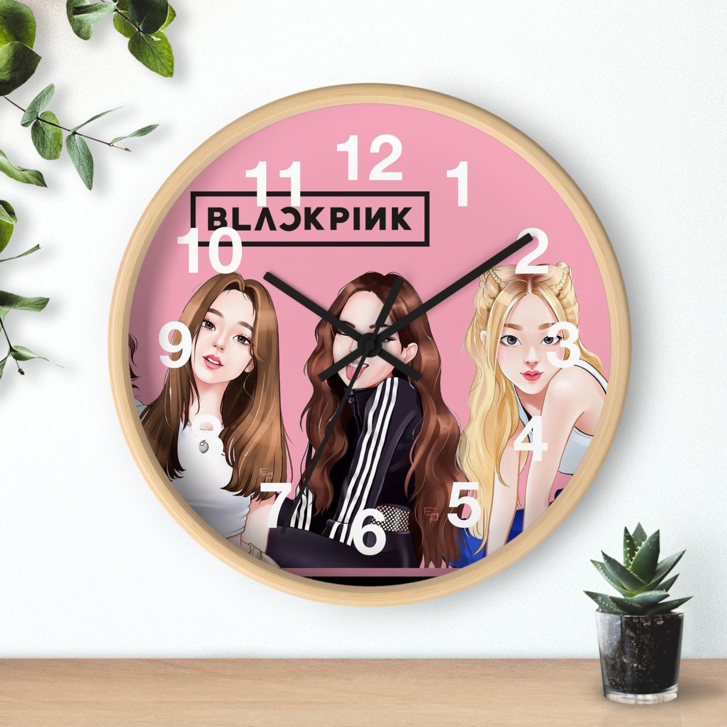 Horloge murale noire et rose –