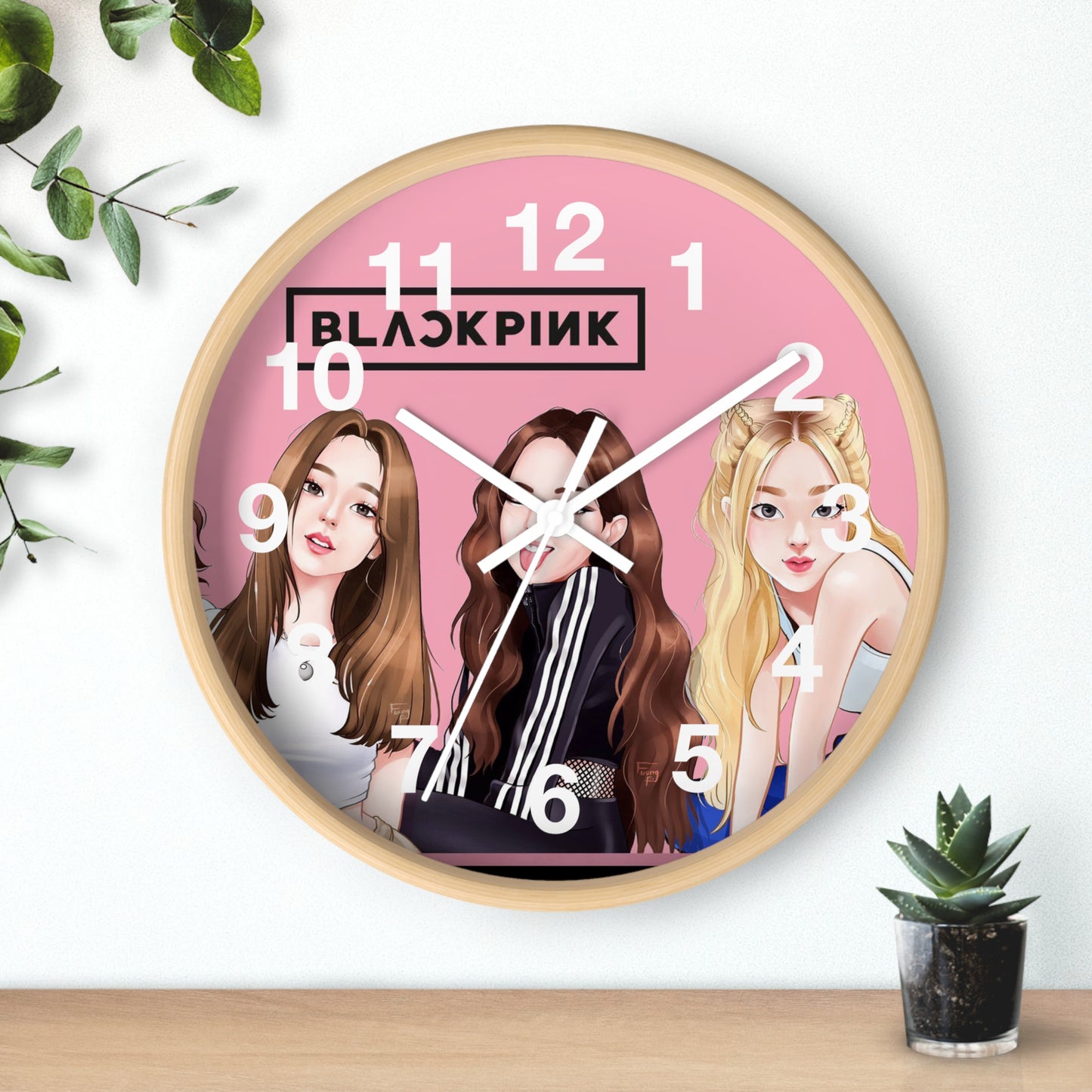 Horloge murale noire et rose –